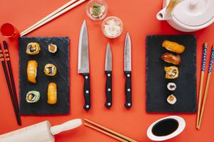 Japanese knife set among Sushi